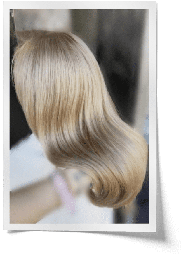 light blond hair, styled in a gentle wave